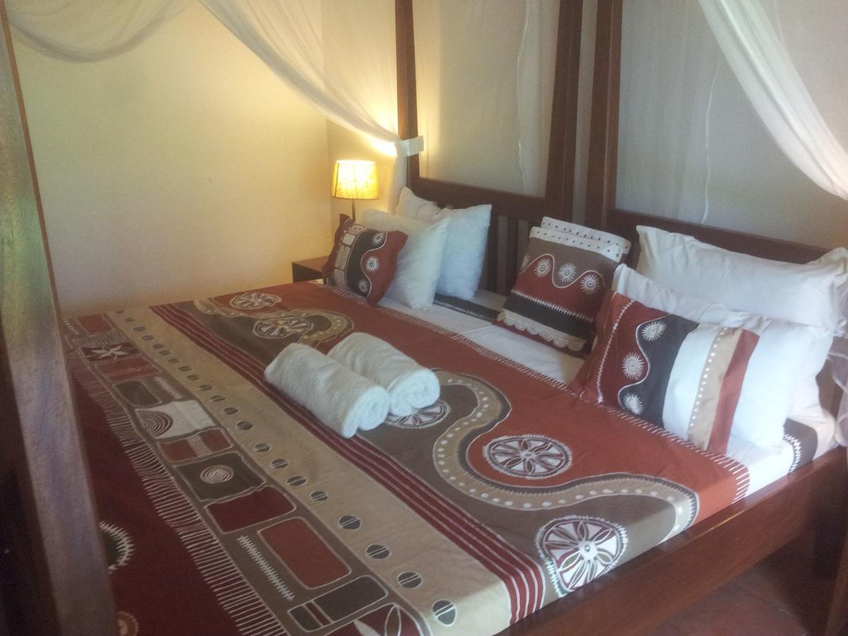 Airport Guesthouse Энтеббе Экстерьер фото