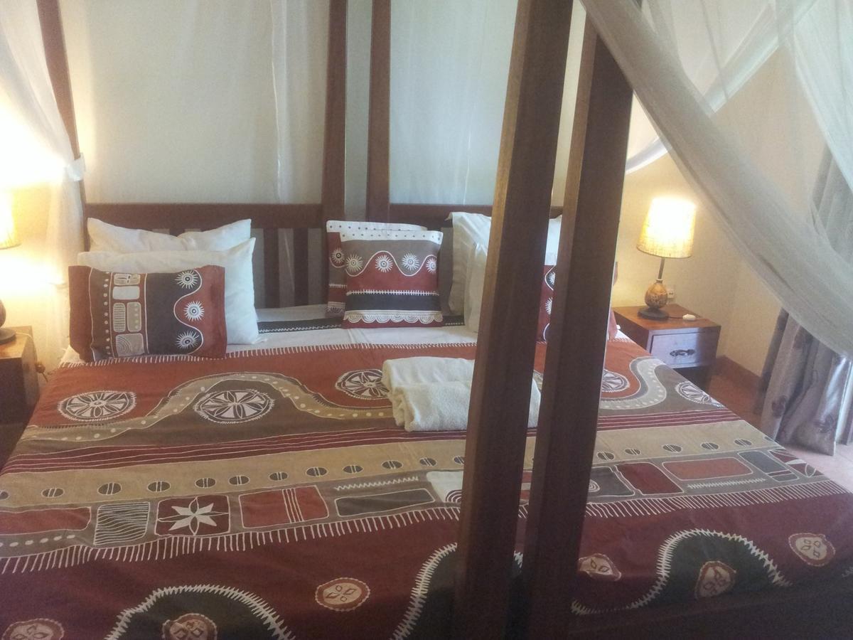 Airport Guesthouse Энтеббе Экстерьер фото